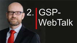 Glatzköpfiger Mann mit Brille, Bart, roter Krawatte neben Text: '2. GSP-WebTalk', getrennt durch rote Linie auf Schwarz.